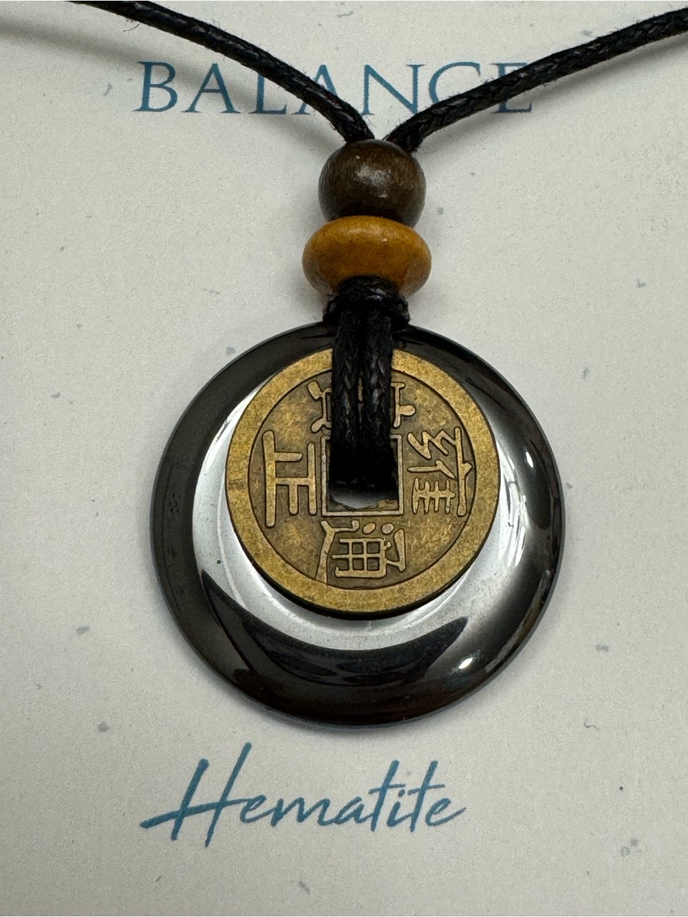 Sacred Earth Amulets Balance Hematite cotton cord adjustable necklace.
